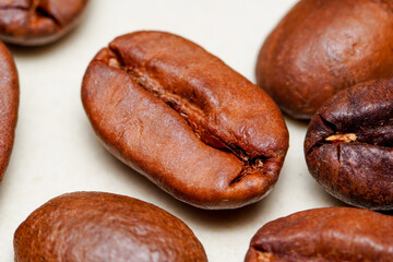 Macro view of fresh coffee beans, extreme close up photo of fresh coffee beans.