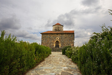 Fototapeta na wymiar The tiny Byzantine church of Timiou Stavros, Peléndhri, Cyprus, one of the Painted Churches in the Troodos Region, and thus a UNESCO World Heritage Site