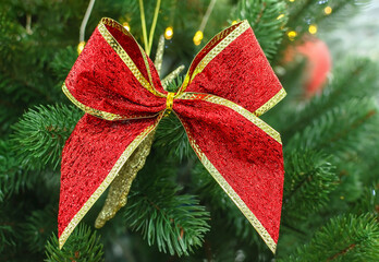 red bow on christmas tree