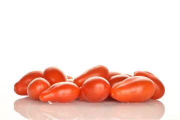 Fresh bright red tomatoes in the shape of a strawberry, close-up, isolated on white.