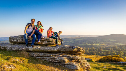 Family in Dartmoor national park in the evening