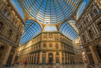 Naklejka premium Naples, Italy - a public shopping gallery built in 1887 and named after King Umberto, Galleria Umberto I is part of the Unesco World Heritage Old Town Naples. Here in particular the interiors