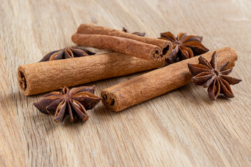 Cinnamon and Star Anise on wooden table.