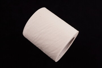 toilet paper on black background