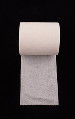 toilet paper on black background
