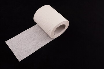 toilet paper on black background