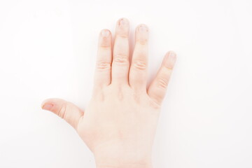 hand of a child on a white background