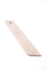 construction knife blades on white background