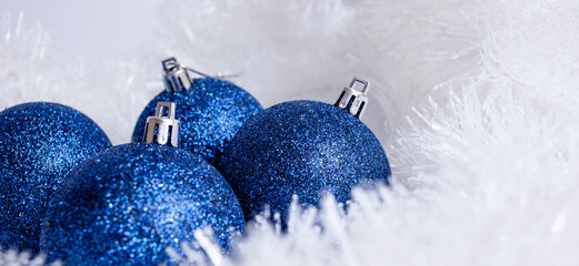 blue christmas ball decoration on snow