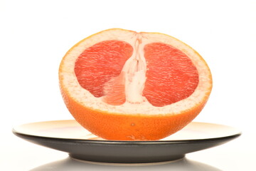 organic ripe grapefruits, close-up, isolated on white.