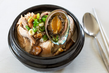 Ginseng chicken soup with abalone which is called Jeonbok Samgyetang