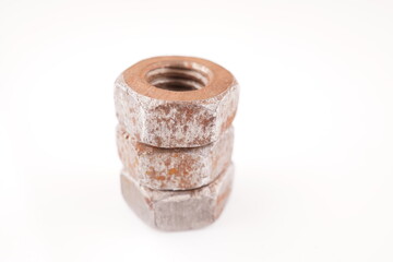 rusty nuts on white background