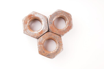rusty nuts on white background