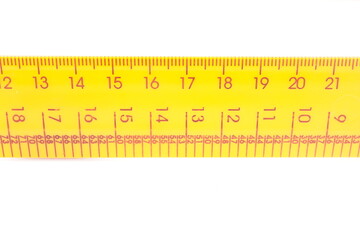 orange ruler on white background