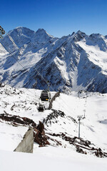 Fototapeta na wymiar View of the gondola lift on the slope of Mount Elbrus, Elbrus region, Caucasus