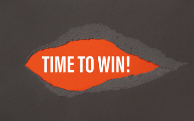 TIME TO WIN - appearing behind torn paper.