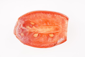 rotten tomato on white background