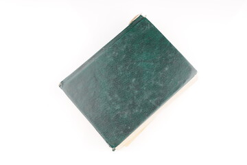 old green dictionary on white background