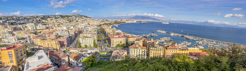Fototapeta na wymiar Naples, Italy - one of the most enchanting landscapes in the country, the Gulf on Naples and the Mount Vesuvius are worldwide famous. Here the gulf and the volcano seen from Posillipo