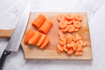 Chopped carrot on the kitchen table