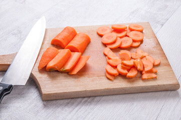 Chopped carrot on the kitchen table
