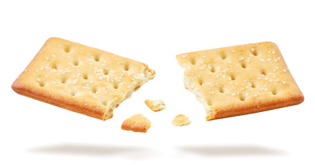 Broken in half cracker flies on a white. Isolated