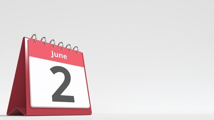 June 2 date on the flip desk calendar page, blank space for user text, 3d animation
