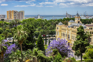 Fototapeta premium Beautiful richly-decorated Neo-baroque style Malaga City Council building. View from Gibralfaro castle. Malaga, Costa del Sol, Andalusia Spain.