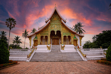Lovely sunset at a lovely temple in Luang Prabang in summer, Laos