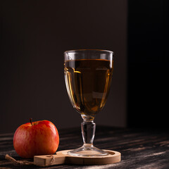 Glass goblet with apple juice