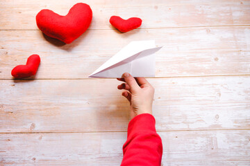 DIY for Valentines day. Instructions step by step. Do it yourself at home. Paper airplane the art of origami. Our paper plane made of simple white sheet is ready. We can play and enjoy. Step 7.