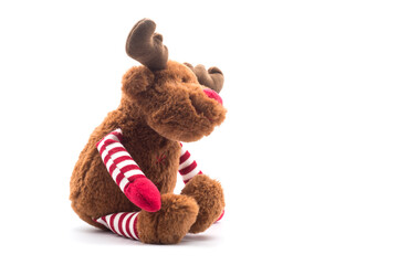 Closeup of reindeer plush sitting on white background reindeer