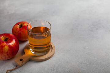 Glass cup with apple juice
