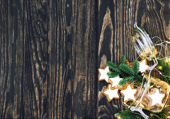 Star cookies Christmas lights decoration rustic wooden background