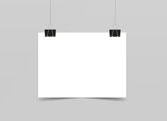 Blank white paper hanging on two binder clips. Mockup for your design. Vector 3d realistic. Poster blank template. paper sheet. Horizontal banner with a shadow on a gray background. EPS10.