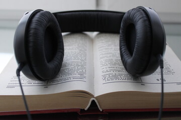 headphones and book