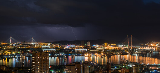 Lightning storm over night city.