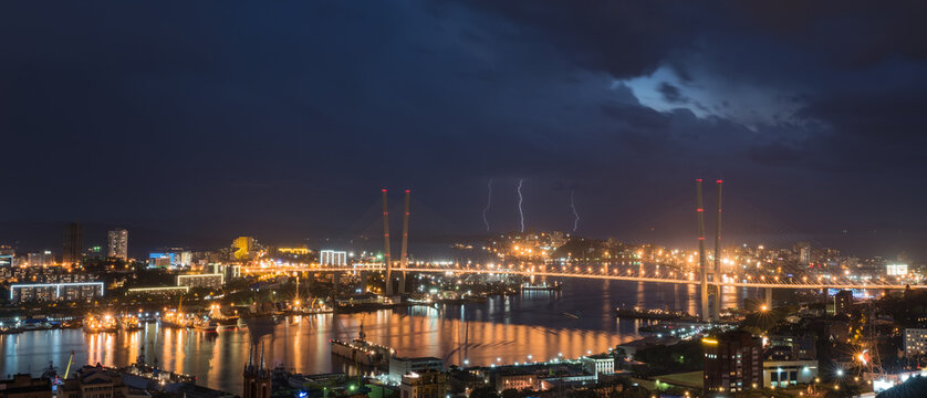 Lightning storm over night city.