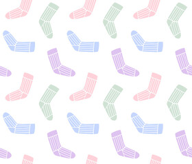 Vector seamless pattern of different color hand drawn doodle sketch knitted sock isolated on white background