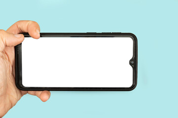 isolated hand holding black cellphone