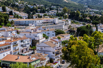 Fototapeta na wymiar Beautiful aerial view of Mijas - Spanish hill town overlooking the Costa del Sol, not far from Malaga. Mijas known for its white-washed buildings. Mijas, Andalusia, Spain.