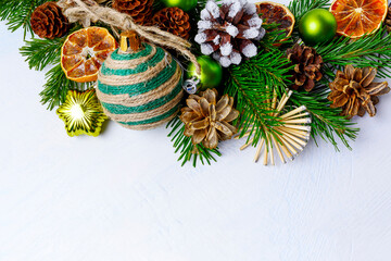 Christmas background with rustic ornaments and pinecones