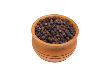 Black peppercorns in wooden bowl isolated on white