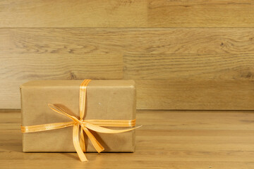 Fototapeta premium Christmas gift box on wooden table