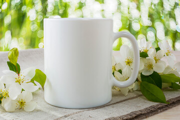 Placeit-Mug mockup with spring apple blossom