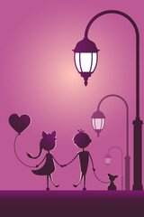 Silhouettes of a boy and a girl walking in the street light.