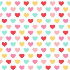 Colorful seamless pattern with simple hearts. Vector background for Valentine's day