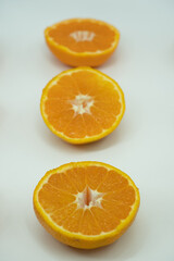 Fototapeta na wymiar tangerine or mandarin isolated on white background. Top view. Flat lay