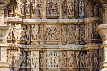 Sculptures carved on the facade of Khajuraho Hindu temples, India	
