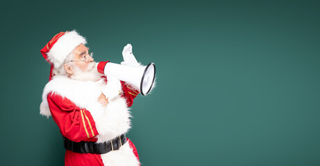 Shocked real Santa Claus screaming news through megaphone.